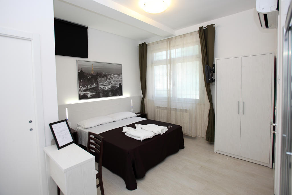 Orchidea Rooms & Suites Чивитанова-Марке Номер фото
