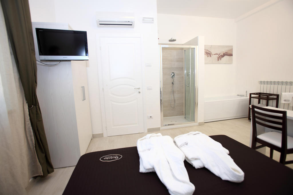 Orchidea Rooms & Suites Чивитанова-Марке Номер фото